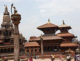 Kathmandu Patan Durbar Square 10 Krishna Mandir, King Yoganarendra Malla Column, Garuda Column, Vishwanath Temple, And Bhimsen Temple The Krishna Mandir temple, King Yoganarendra Malla column, Garuda column, Vishwanath Temple, and Bhimsen Temple occupy the west side of Patan�s Durbar Square. Vishwanath (Shiva) Temple (1627) is an elaborately decorated two-roofed temple with two stone elephants guarding the entrance. The Bhimsen Temple (1682) at the northern end of Durbar Square is a three-story temple dedicated to the god of trade and business.